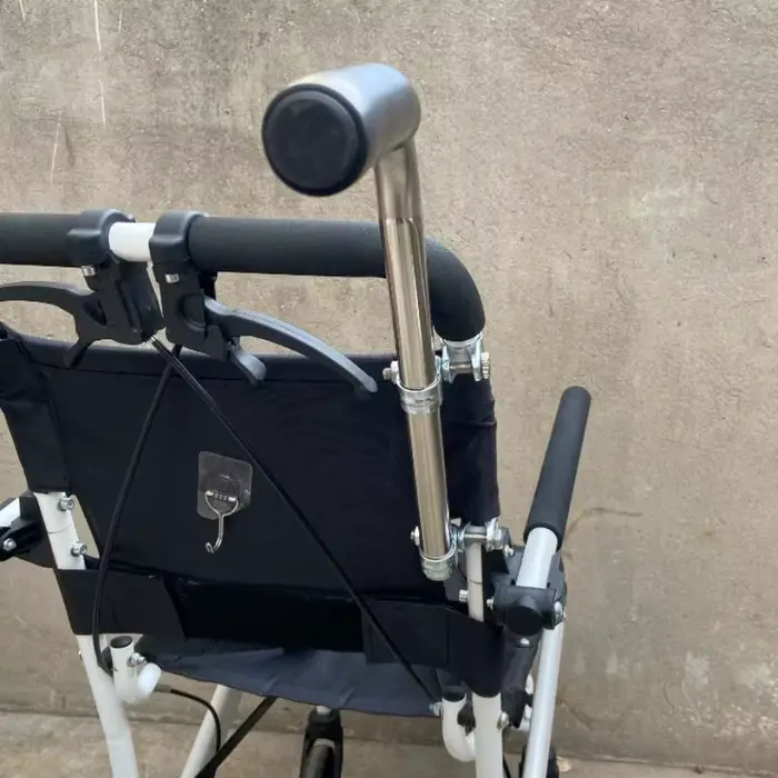 Poignée universelle en acier inoxydable pour fauteuil roulant